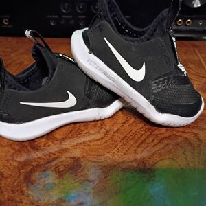 Nike Kids Black and White Slip-On Sneakers